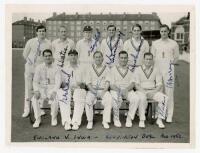 England v India. The Oval 1952. Original mono press photograph of the England team for the 4th (final) Test at The Oval, 14th- 19th August 1952. The players seated and standing in rows wearing cricket attire. Very nicely signed in ink to the photograph by