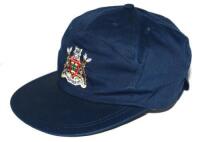 Bruce French. Nottinghamshire &amp; England 1976-1995. Navy blue baseball style cap with Nottinghamshire coat of arms to front. Signed in ink to inside by French with initials 'BNF' to label, and sold with a signed note of authentication stating 'This Not