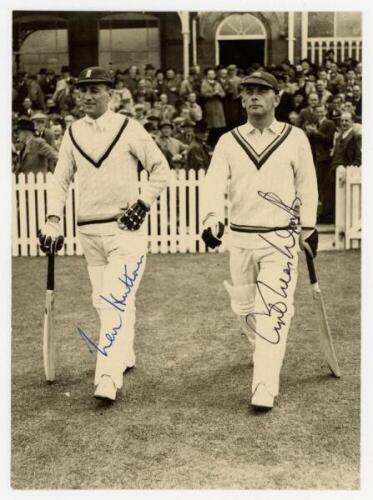 Len Hutton and Cyril Washbrook 1950s. Original mono press photograph of Hutton and Washbrook walking out to bat at Trent Bridge. Signed in ink to the photograph by both players. Date, match and publisher unknown. 5.5&quot;x7.5&quot;. VG - cricket