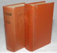 Wisden Cricketers' Almanack 1921 and 1922. 58th &amp; 59th edition. Both editions bound in light brown boards, with original paper wrappers, gilt titles to spine. The 1921 edition with light soiling and some wear to wrapper corners and extremities, small 