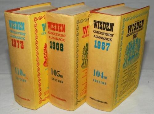 Wisden Cricketers' Almanack 1967, 1968 and 1973. Original hardbacks with dustwrapper. The 1967 edition with minor wear and tear to head of dustwrapper, the 1968 edition with minor wear and slight soiling to dustwrapper and the 1973 with some soiling to pa