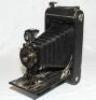 Photographic equipment. Eastman Kodak. c.1920 'No. 3A Autographic Kodak Junior' folding bed camera with Rapid Rectilinear lens by Bausch &amp; Lomb and Kodak ball bearing shutter. Appears to feature three serial numbers, 12428 to shutter/ lens, 13460 to f - 2