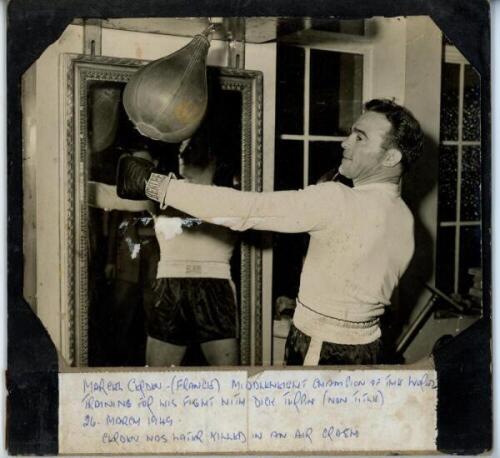 Boxing photographs c1949. Three original mono press photographs, one of French boxer Marcel Cerdan in training action, world middleweight champion 1948, dated 26th March 1949. The others of Americans Lee Savold, heavyweight, undated, and Baby Day, middlew