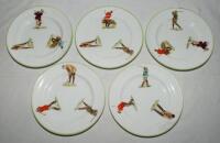 Alfred B. Pearce of London. Golf Series. Collection of five golfing side plates, each with three figures of golfers in action with light green rims. Each plate different. Makers stamps and reg 480949 to base. 6.75&quot; diameter. Hairline crack to edge o