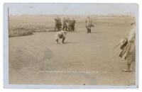 Golf Open Championship, Hoylake, Liverpool, 23rd &amp; 24th June 1913. Rare original sepia real photograph postcard of an unknown player lining up a putt. No. 14 in a series. Series unknown. Short handwritten message in ink to verso. Slight wear to corner