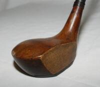 Hickory driver c.1920. Maker's mark to crown of head for J.H. Taylor, 'Cann &amp; Taylor'. Hickory shaft and leather grip. Good original condition - golf