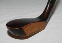 Long nose wooden headed putter c.1880. Maker unknown. Hickory shaft and suede grip. Appears to be restored, in good condition - golf