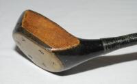 Donald J. Ross of Pinehurst 'Brassie' c.1915. Maker's mark 'D.J. Ross' stamped to crown of club head. Hickory shaft, leather grip. Good original condition - golf
