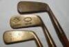 Three blade putters with brass heads c.1915-1925. Maker's marks for G.H. Taylor (Cann &amp; Taylor)/ Robinson &amp; Co. Singapore, 'MCF', and Glasgow Golf Club 'Thistle Brand'. Hickory shafts, two with suede grips, the other leather. Good original conditi - 2