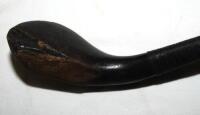 Early long nosed putter by Robert Forgan of St. Andrews c.1880. The putter with wooden head and metal inserts, hickory shaft, leather grip. Some damage and loss to the club head, otherwise in good condition - golf