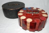 Boxed set of poker chips c.1920s, contained in circular bakelite container with central brass handle and lid, set on a rotating stand. The chips with impressed figures of golfers. Maker unknown. 9.5&quot; diameter, 4.25&quot; tall. G - golf