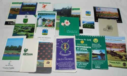 Golf yardage books and scorecards. Yellow box file comprising nineteen modern golf course yardage booklets for courses worldwide including St. Andrews Old Course, and others in France, Tenerife, Germany, Canada, U.S.A. etc. Also over one hundred scorecard