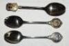 Tennis spoons c.1930. Three EPNS plated spoons, each handle end with tennis decoration. One with mark for 'Ancora', the other pair unmarked. G - tennis