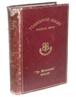 'Yorkshire Rugby Football Union Commemoration Book 1914-19 and Official Handbook Season 1919-20'. 'Published by Authority' 1919. Printed by Chorley &amp; Pickersgill Ltd., Leeds. Bound in original red leather with gilt titles to front and spine. Some loss