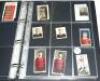 Nottingham Forest F.C. Red file comprising cigarette cards, trade cards and stickers, menus, cuttings, etc., a good number signed. Early cigarette cards of Nottingham Forest players include Ogden's 'Football Club Colours' 1906 no. 24. Godfrey Phillips 'Pi - 3