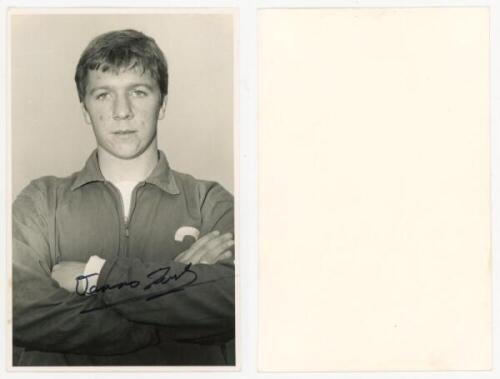 Dennis Bond. Watford, Tottenham Hotspur and Charlton Athletic. Mono real photograph plain back postcard of Bond, head and shoulders with arms folded. Signed in black ink to the photograph by Bond. Publisher unknown. Excellent condition - football<br><br>B