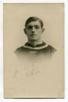 Ephraim 'Ernie' Rhodes. Crystal Palace 1913-1923. Sepia real photograph postcard of Rhodes wearing Palace shirt in cameo with name printed beneath. Signed below the image by Rhodes, but sadly now fading, though legible. Postcard by T.H. Everett Studios of