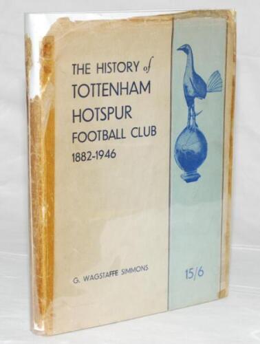 'The History of Tottenham Hotspur Football Club 1882-1946'. G. Wagstaff Simmons. Published by the Club 1947. Original dustwrapper with old tape repairs and loss to spine and back. The book with some light fading to cloth covers, otherwise in very good con