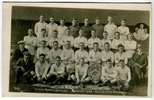 Tottenham Hotspur F.C. 1919/20. Mono real photograph postcard of the playing staff and officials standing and seated in rows plus inset cameo of three players, with title printed to lower border 'Tottenham Hotspur. League Champions II Division, Winners, N