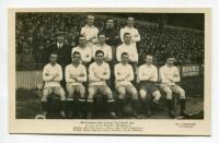 'Tottenham Hotspur Cup Team 1921'. Early mono real photograph postcard of the team and trainer, Minter, standing and seated in rows on the pitch with the large crowd behind them, with printed title 'Tottenham Hotspur Cup Team 1921' and players names print