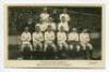 'Tottenham Hotspur Cup Team 1921'. Early mono real photograph postcard of the team and trainer, Minter, standing and seated in rows on the pitch with the large crowd behind them, with printed title 'Tottenham Hotspur Cup Team 1921' and players names print