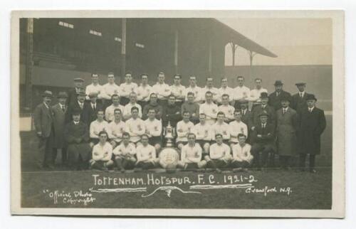 Tottenham Hotspur F.C. 1921/22. Mono real photograph postcard of the team, officials and Directors, standing and seated in rows, with title 'Tottenham Hotspur F.C.. 1921-2' printed to lower border. W.J. Crawford of Edmonton. Postally unused. Good/very goo