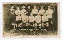 Tottenham Hotspur F.C. 1922/23. Mono real photograph postcard of the team and trainer, standing and seated in rows. Players names printed in black to lower border. W.J. Crawford of Edmonton. Postally unused. Good/very good condition - football<br><br>Spur