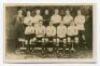 Tottenham Hotspur F.C. 1922/23. Mono real photograph postcard of the team and trainer, standing and seated in rows. Players names printed in black to lower border. W.J. Crawford of Edmonton. Postally unused. Good/very good condition - football<br><br>Spur