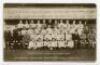 Tottenham Hotspur F.C. 1923/24. Mono real photograph postcard of the team, officials and Directors, standing and seated in rows, with title 'Tottenham Hotspur. Team &amp; Directors. 1923/1924' printed to lower border, team names printed to top and lower b