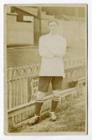 Arthur Dixon. Tottenham Hotspur 1907/08. Sepia real photograph postcard of Dixon, full length, in Spurs attire. Jones Brothers of Tottenham. Postally unused. Some light fading to image otherwise in good condition - football<br><br>Dixon made 12 appearance
