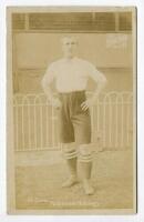 William Dow. Tottenham Hotspur 1905-1908. Early sepia real photograph postcard of Dow, full length, in Spurs attire. Jones Brothers of Tottenham. Postally unused. Some light fading to image otherwise in good condition - football<br><br>Dow made only nine 