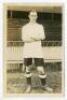 William Cartwright. Tottenham Hotspur 1913. Sepia real photograph postcard of Cartwright, full length, in Spurs attire. Jones Brothers of Tottenham. Postally unused. Odd minor faults otherwise in good/very good condition. Rare - football<br><br>Cartwright