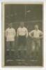 Arthur Grimsdell. Tottenham Hotspur 1912-1929, James Cantrell. Tottenham Hotspur 1912-1922 and Herbert Bliss. Tottenham Hotspur 1912-1922. Mono real photograph postcard of the three players, full length, in Spurs attire on the pitch in front of a packed W