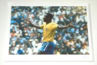 'Pele'. Large colour limited photographic giclee print of Pele in action for Brazil by Washington Green Fine Art. . Signed to lower border by Pele in pencil. Limited edition of 225 prints, this being number 24, with certificate of authenticity, brochure a