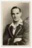 Herbert Sutcliffe. Yorkshire &amp; England 1919-1945. Mono real photograph postcard of Sutcliffe, half length, wearing England touring blazer. Nicely signed in blue ink by Sutcliffe. Very good condition - cricket