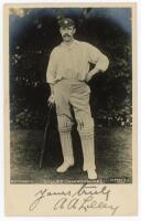 Arthur Frederick Augustus 'Dick' Lilley. Warwickshire, London County &amp; England 1894-1911. Mono real photograph postcard of Lilley, full length, in cricket attire. Nicely signed in black ink by Lilley to lower border. Rapid series no. 1235. Postally un
