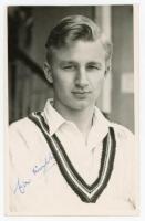 Clement Arthur Milton. Gloucestershire &amp; England 1948-1974. Excellent mono real photograph plain back postcard of Milton, head and shoulders wearing cricket attire. Stamp for A. Wilkes &amp; Son, West Bromwich to verso. Signed by Milton to image. VG -
