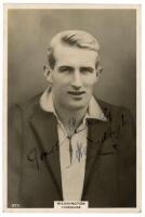 Abraham 'Abe' Waddington. Yorkshire &amp; England 1919-1927. Godfrey Phillips 'Pinnace' premium issue cabinet size mono real photograph trade card of Waddington, head and shoulders wearing cricket attire and blazer. Signed in black ink to the photograph b