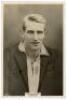 Abraham 'Abe' Waddington. Yorkshire &amp; England 1919-1927. Godfrey Phillips 'Pinnace' premium issue cabinet size mono real photograph trade card of Waddington, head and shoulders wearing cricket attire and blazer. Signed in black ink to the photograph b