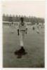 Barry Rolfe Knight. Essex, Leicestershire &amp; England 1955-1969. Mono plain back real photograph postcard of Knight, wearing M.C.C. sweater, walking off the field at Scarborough with teammates in the background. Date and publisher unknown. VG - cricket