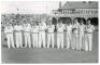 Australia tour to England 1953. Mono real photograph plain back postcard of the Australian team for the match v T.N. Pearce's XI, Scarborough 9th- 11th September 1953. The players lined up in one row wearing cricket attire, the pavilion in the background.