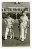 New Zealand tour to England 1958. Mono real photograph plain back postcard of John D'Arcy and Lawrie Miller walking out to bat at Scarborough for the match v T.N. Pearce's XI, 10th- 12th September 1958. Assumed to be by Walkers Studios of Scarborough. Sma