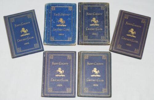 Kent County Cricket Club Annual 1919-1924. Six editions of the hardback 'blue book'. Original decorative boards. Gilt titles with gilt Kent emblem to centre. 'Light' fading to spines, wear to some boards, splitting to spine of the 1920, 1922 and 1924 issu