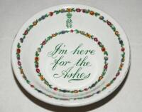 'I'm Here For The Ashes' 1926. Rare and unusual dish, early 20th century, with centre inscription in green lettering with monogram 'GR' and Kings crown above. The centre and rim with colourful flower and floral decoration. 'Losol Ware. Keeling &amp; Co Lt