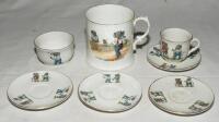 'Jumbo' nursery ware. Selection of a cup and saucer, a tankard, a small bowl and three further saucers each decorated with image of Jumbo playing cricket, tennis, hockey, skating etc. Gold lustre to edges. The tankard stands 3.5&quot; tall, the saucers 3.