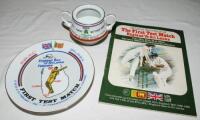 'Sri Lanka v England. 100 Years of Cricket with England. Inaugural Test Match 1982'. Rare white porcelain sugar [?] bowl with two strap handles and raised foot. The bowl in squat conical form. Silver band on rim, foot and handles. Blue and red band on rim