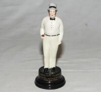 William Clarke. China figure of Clarke in cricket attire. To base 'William Clarke. Founder of Trent Bridge 28th May 1838'. 6.5&quot; tall. G - cricket