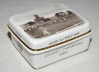 'Worcestershire County Cricket Club. County Champions 1964'. Royal Worcester china cigarette box/trinket box produced by the Worcester factory to commemorate the Championship win. The lid with famous scene of the Worcester ground with a match in progress,