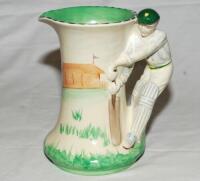 Burleigh Ware 'style' art deco ceramic cricket jug. The jug based on the 1930's original with cricket field and pavilion design to body with 'batsman' handle in white and green was produced in 2000 by Burgess, Dorling and Leigh, Burslem, near Stoke on Tre