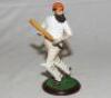 'W.G. Grace'. Large hand painted resin figure of Grace, modelled full length, wearing M.C.C. cap, mounted on wooden plinth. Approx 9&quot; tall. Fairweather Collection. G - cricket